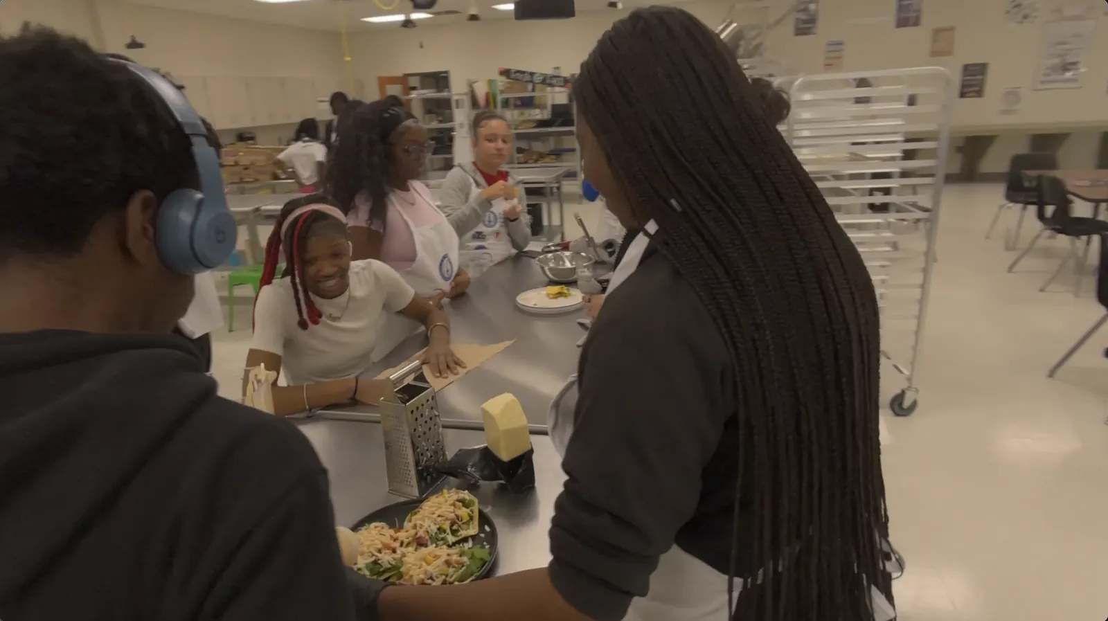 Students plating tacos in the lab